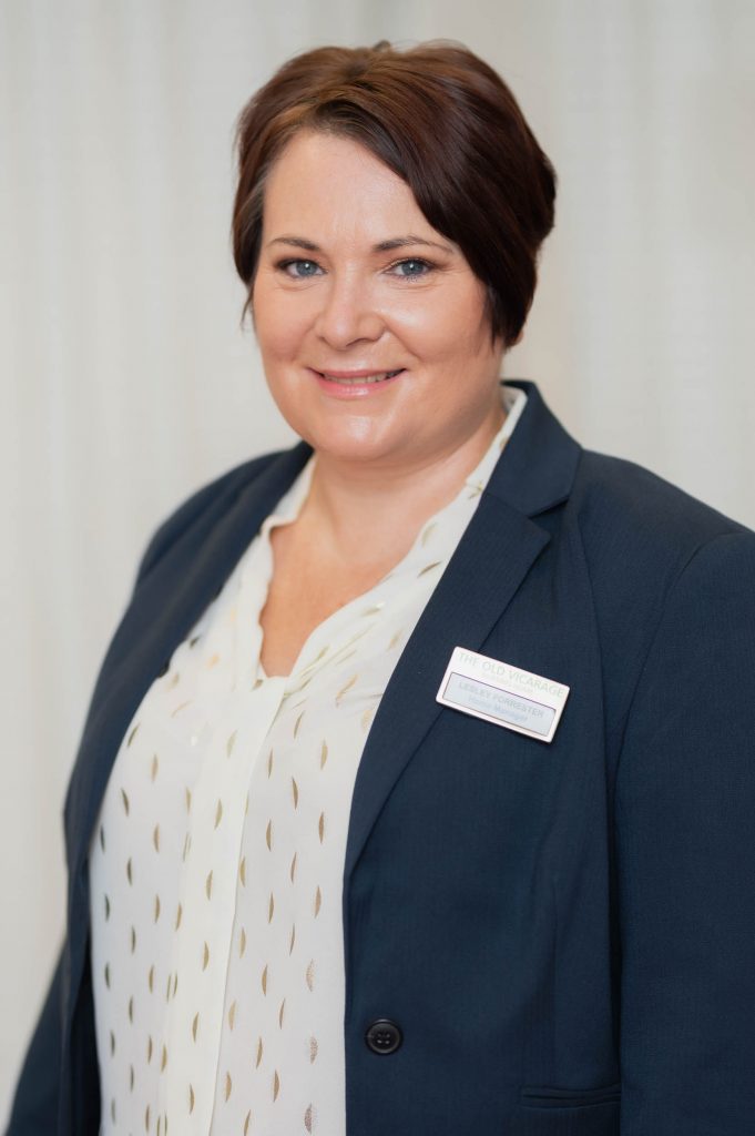 Headshot of a smiling member of staff.